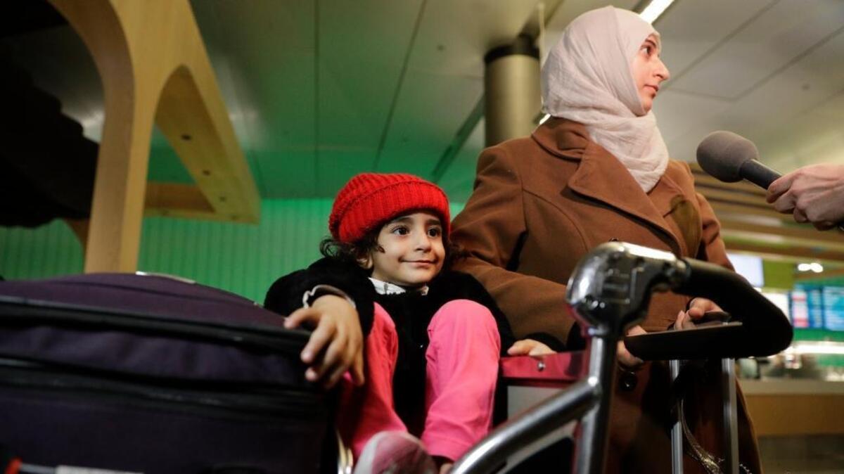 Samar Alwahiri and daughter Laila Alamri of Yemen arrive Wednesday at Los Angeles International Airport.