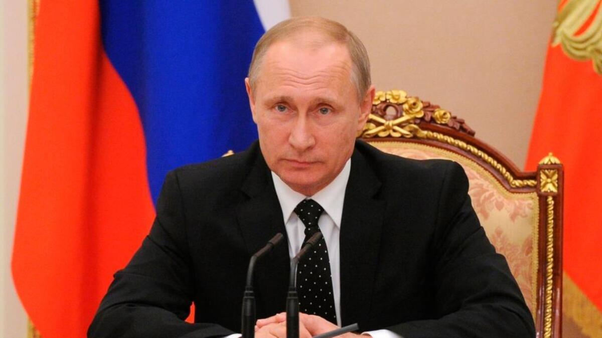 Cybersecurity analysts say the hack of DNC emails has the markings of Russian military intelligence, controlled by President Vladimir Putin, shown here.