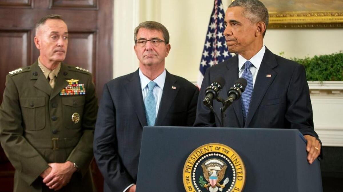 
President Barack Obama, with Joint Chiefs Chairman Gen. Joseph Dunford, left, and Defense Secretary Ash Carter, announced Thursday that he will keep U.S. troops in Afghanistan until he leaves office in 2017. 
