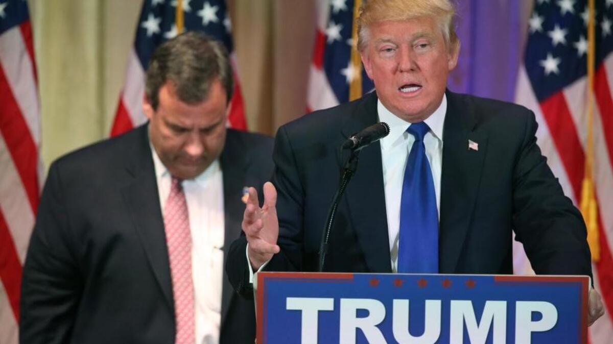 As Donald Trump speaks on Super Tuesday in Palm Beach, Fla., New Jersey Gov. Chris Christie did not look thrilled to be there.