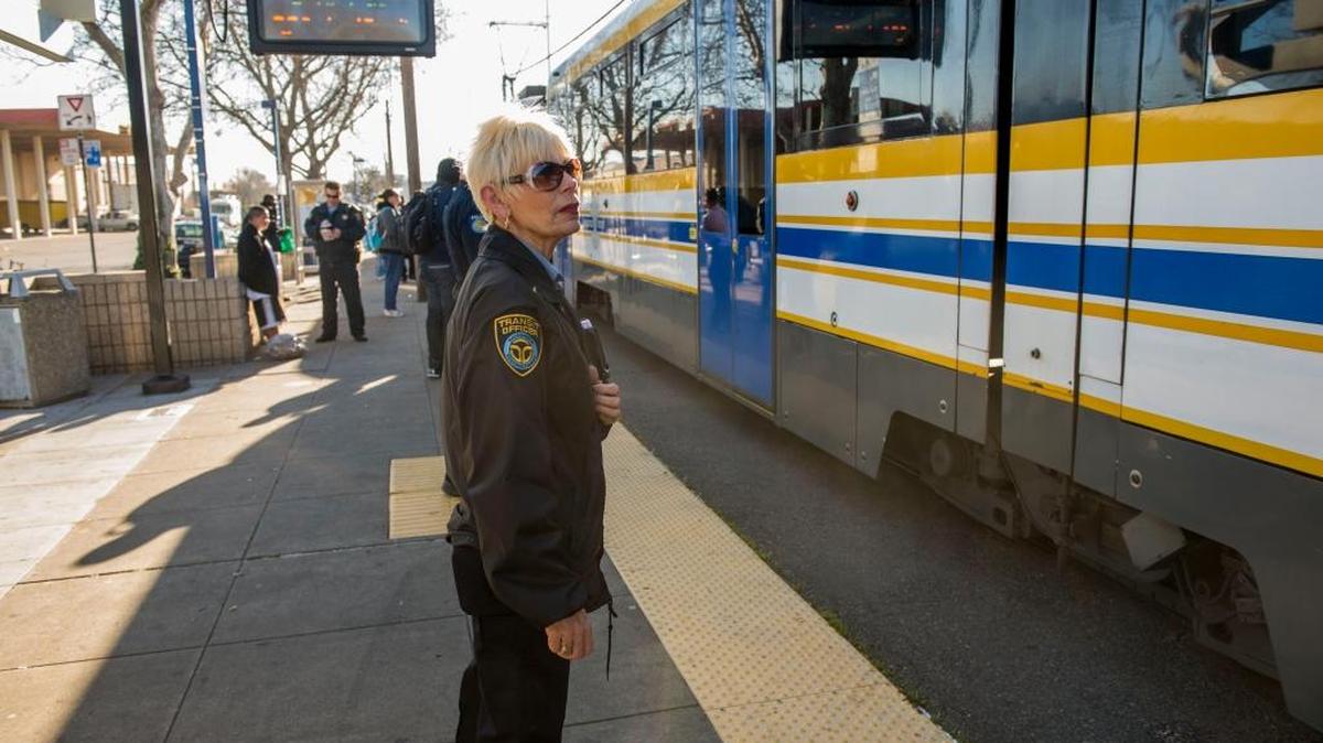 Regional Transit Officer Susie Marcketti waits to board a train. RT would benefit from a proposed sales tax hike.
