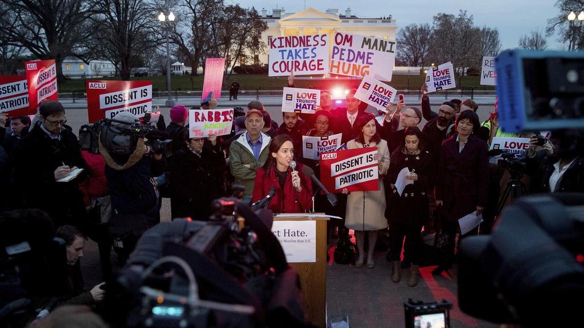 People gather for a protest against President Donald Trump’s new travel ban order outside the White House on Monday, March 6, 2017.