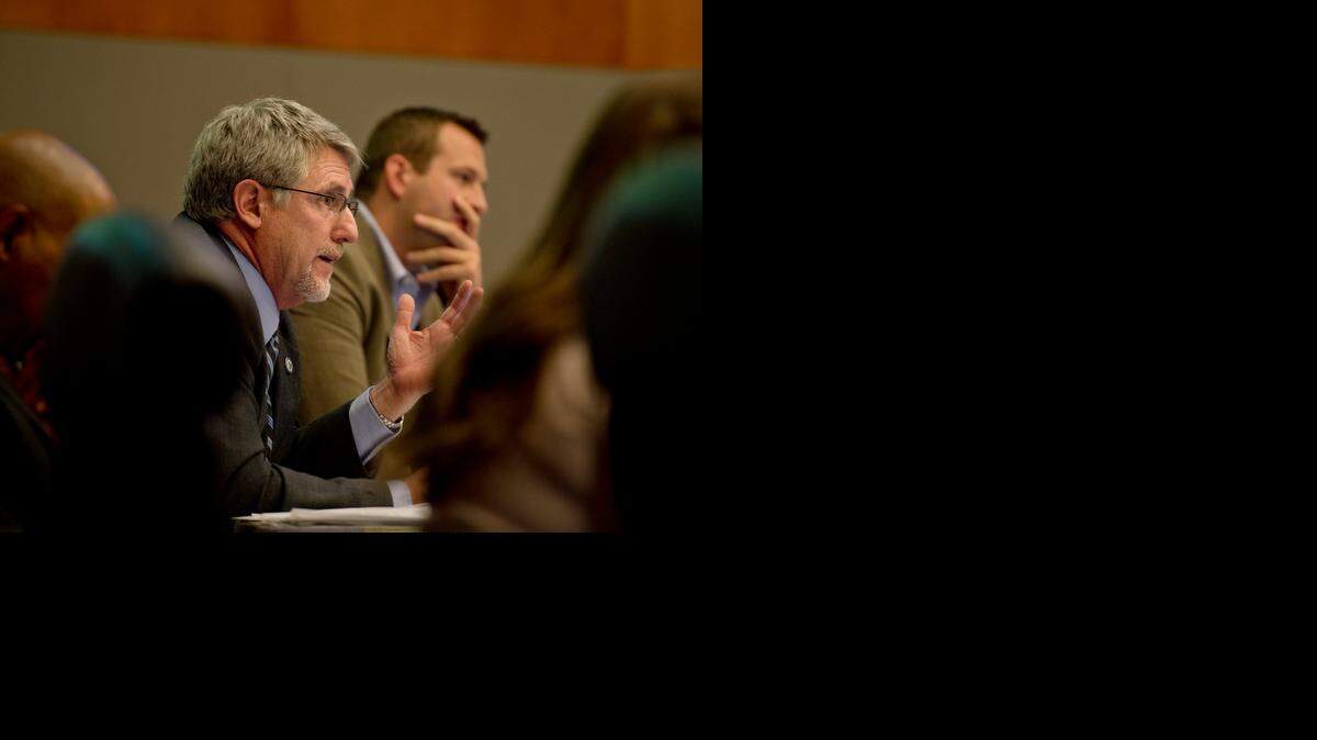 
Outgoing Sacramento City Councilman Steve Cohn asks questions to the developer of the McKinley Village development during an April meeting. 
