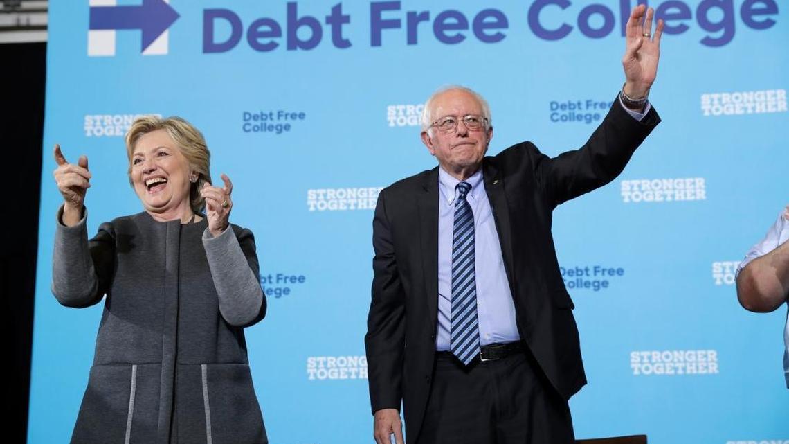 Democratic presidential nominee Hillary Clinton and Sen. Bernie Sanders campaign together Wednesday at the University of New Hampshire.