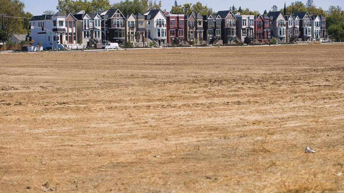 The retail part of Curtis Park Village will be built across the street from the The Brownstones on Crocker Drive.