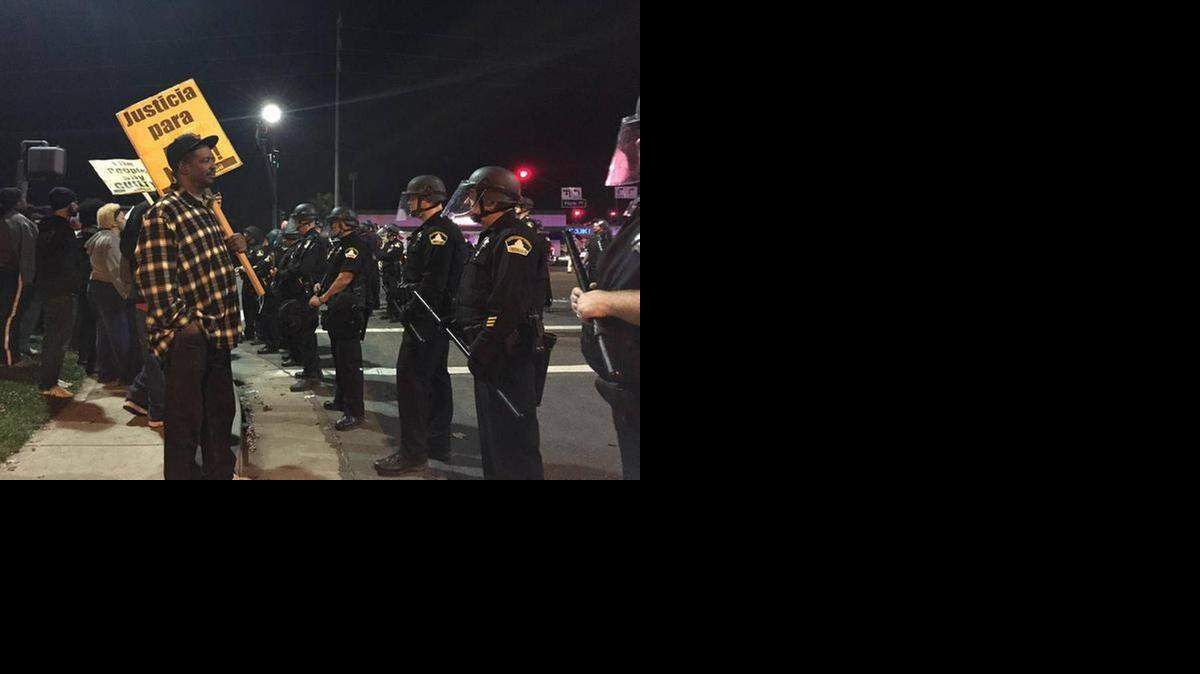 
Marchers near Florin Road in Sacramento protest the St. Louis County grand jury’s decision Monday night not to indict Ferguson, Mo., police Officer Darren Wilson in the shooting death of Michael Brown. 
