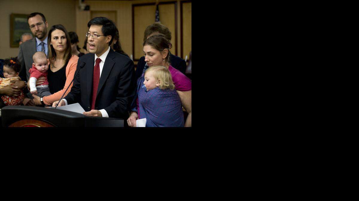 
Sens. Richard Pan of Sacramento, at podium, and Ben Allen of Santa Monica, far left, introduce legislation that would end California’s vaccine exemption loophole. The bill has broad backing, but no guarantee of passage as the public moves on from the Disneyland measles outbreak. 
