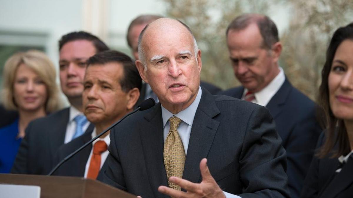 Gov. Jerry Brown discusses water conservation after a meeting last year with city mayors. The state has since fallen behind on mandated savings, thanks to overconfidence in El Niño and warmer-than-expected weather this month.