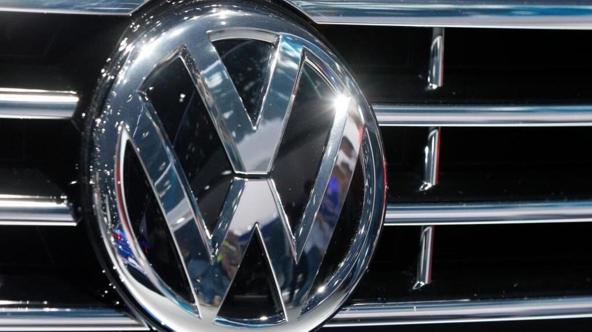 Reeling from its emissions cheating scandal, Volkswagen is offering $1,000 in cash and vouchers to owners of smaller diesel cars as a gesture of goodwill.