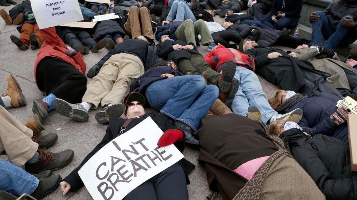 
Protesters demonstrate in New York last December against a grand jury decision not to indict a policeman in the chokehold-related death of Eric Garner. 

