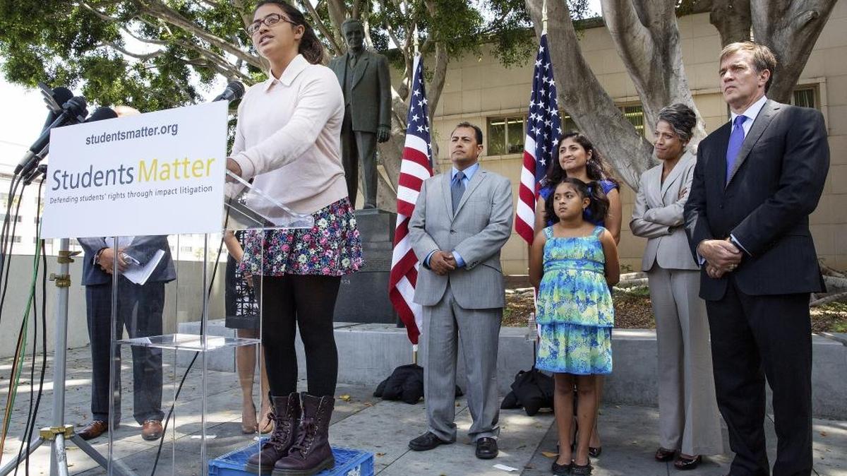 Julia Macias, one of the nine student plaintiffs in the case where a judge ruled California's teacher tenure laws unconstitutional, speaks in Los Angeles in 2014. The ruling was overturned on appeal and on Monday, the California Supreme Court decided not to review the case.