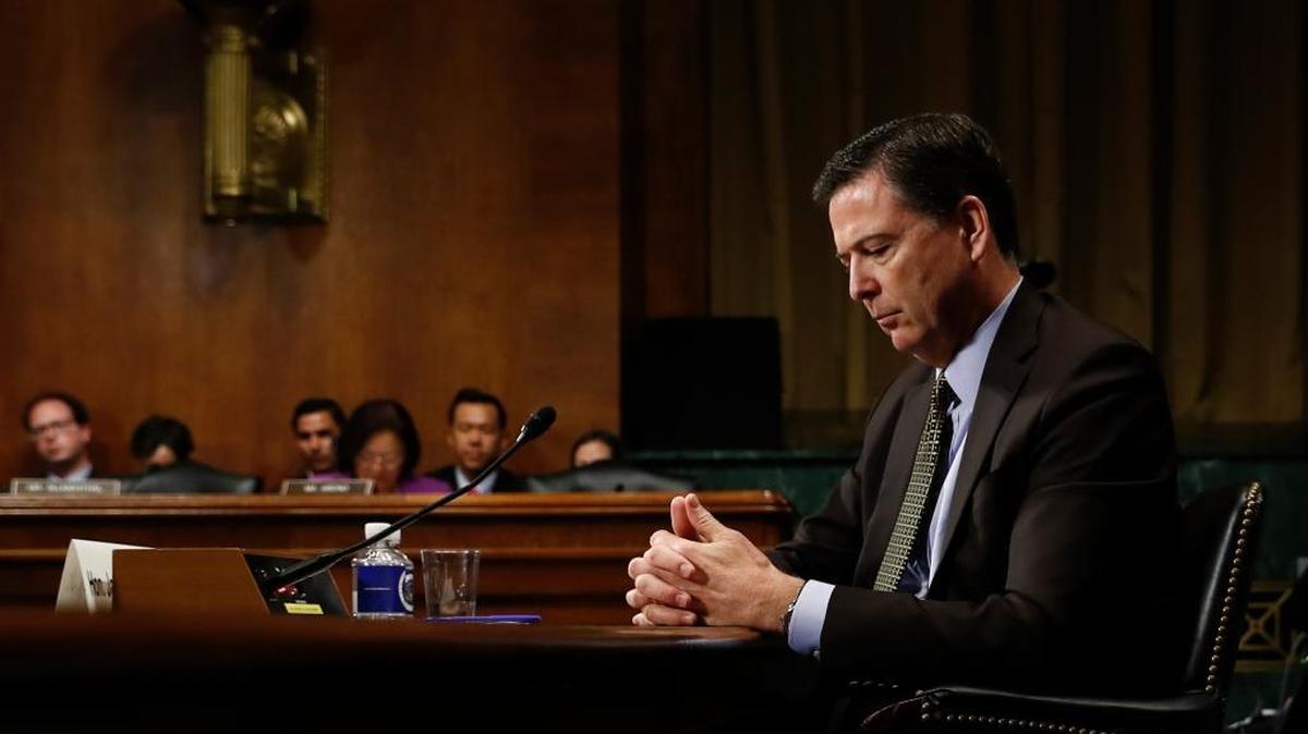 In this May 3, 2017, photo then-FBI Director James Comey pauses as he testifies on Capitol Hill in Washington during a Senate Judiciary Committee hearing. President Donald Trump abruptly fired Comey on Tuesday, May 9, 2017, ousting the nation’s top law-enforcement official in the midst of an investigation into whether Trump’s campaign had ties to Russia’s election meddling.
