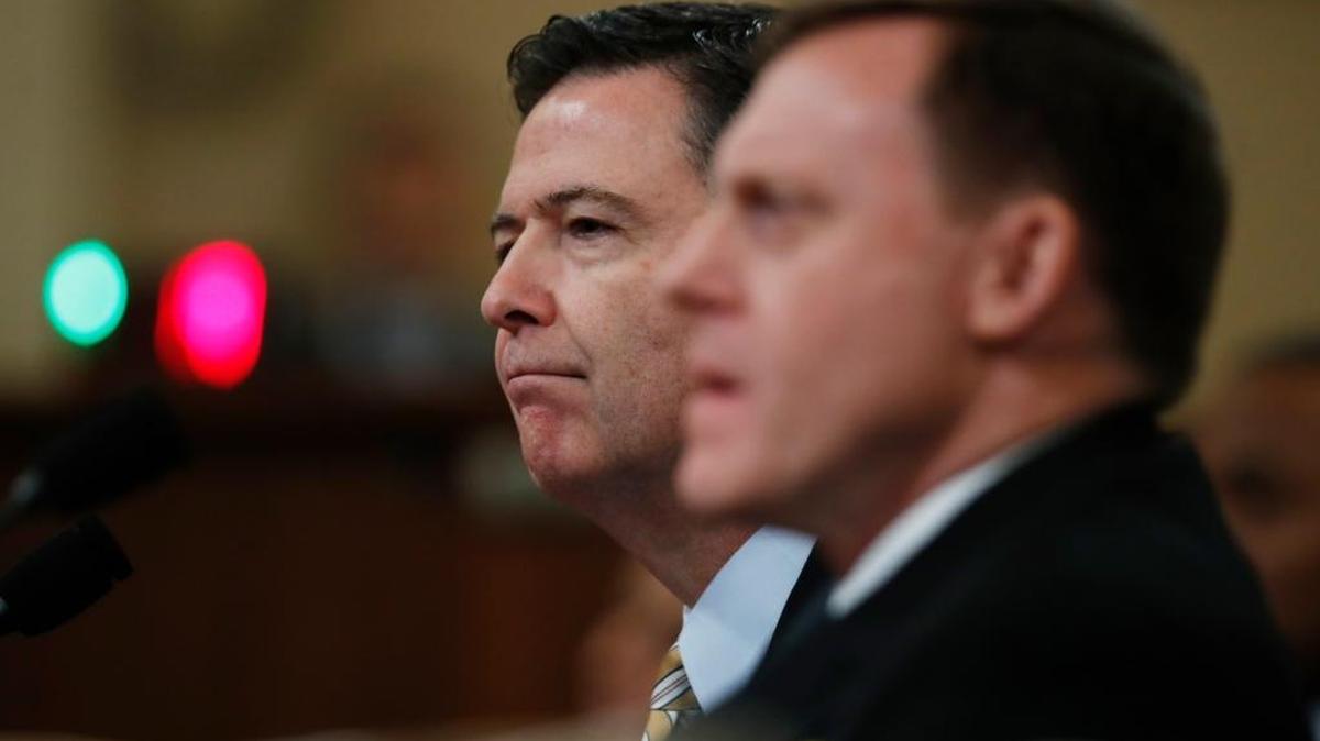 FBI Director James B. Comey, left, joined by National Security Agency Director Michael Rogers, testifies on Capitol Hill on Monday before the House Intelligence Committee hearing on allegations of Russian interference in the 2016 U.S. presidential election.