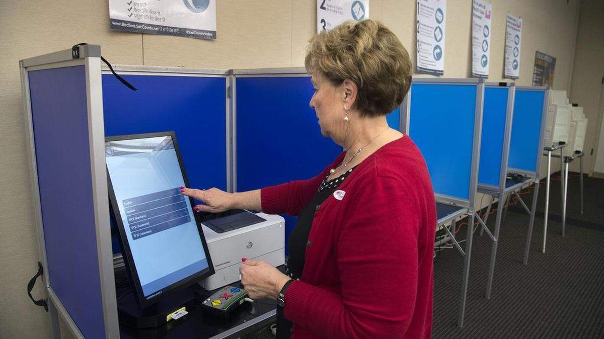 Jill Lavine, registrar of voters for Sacramento County, demonstrates a digital voting machine last month.