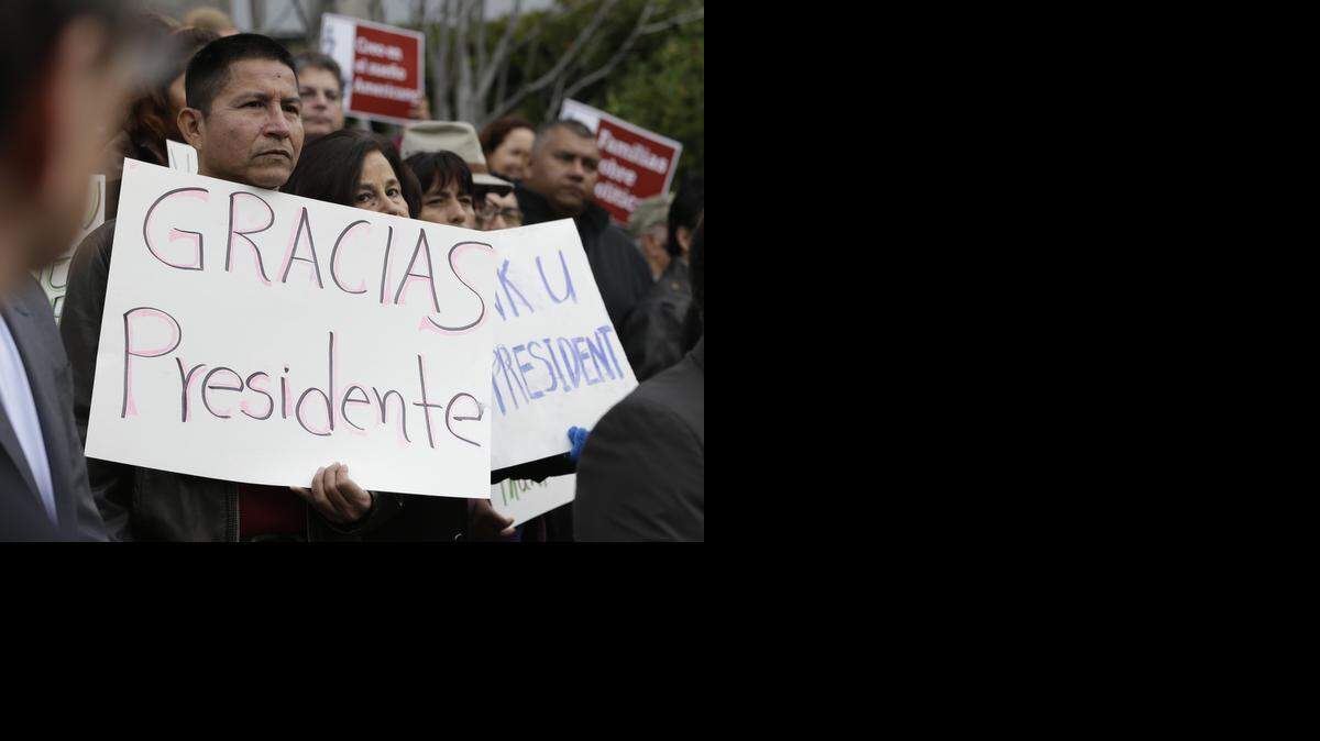 
Sebastian Montalvan, left, who has been living in the country illegally, joined dozens of others who are here illegally, as well as activists and supporters to celebrate President Barack Obama’s executive action on illegal immigration, at a at a news conference in Sacramento, Calif., Friday, Nov. 21, 2014.
