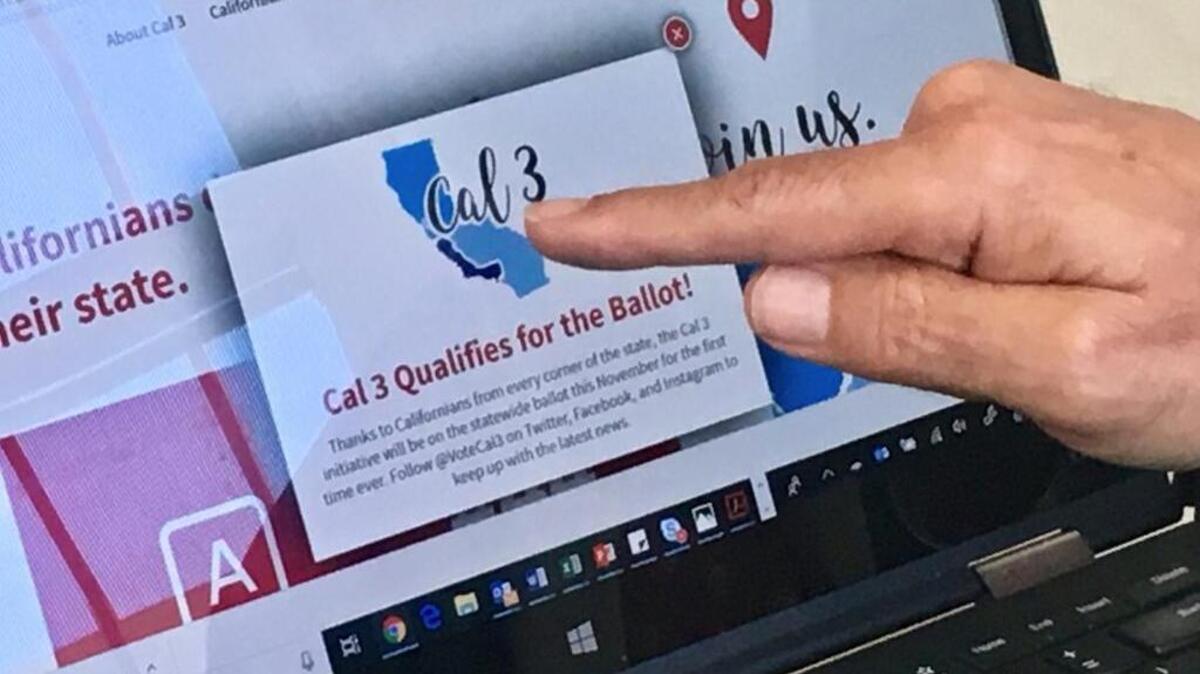 Venture capitalist Tim Draper points to a computer screen at his offices in San Mateo on June 18 showing that an initiative to split California into three states qualified for the ballot.