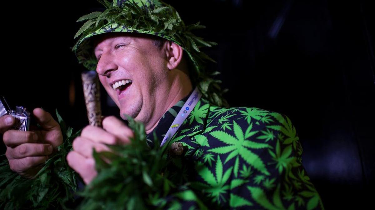 A man who wished to be identified only as “Big Mike” celebrates at an election party hosted by the Berkeley Patients Group for Proposition 64, which legalized recreational pot.