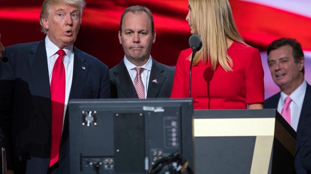 Then campaign manager Paul Manafort, right, and his chief deputy Rick Gates, center, watch as Donald Trump and Ivanka Trump rehearse for the Republican National Convention in Cleveland in July 2016.