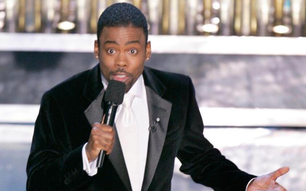 Chris Rock, who hosted the 2005 Academy Awards, will host again Sunday amid backlash over the entirely white slate of acting nominees.