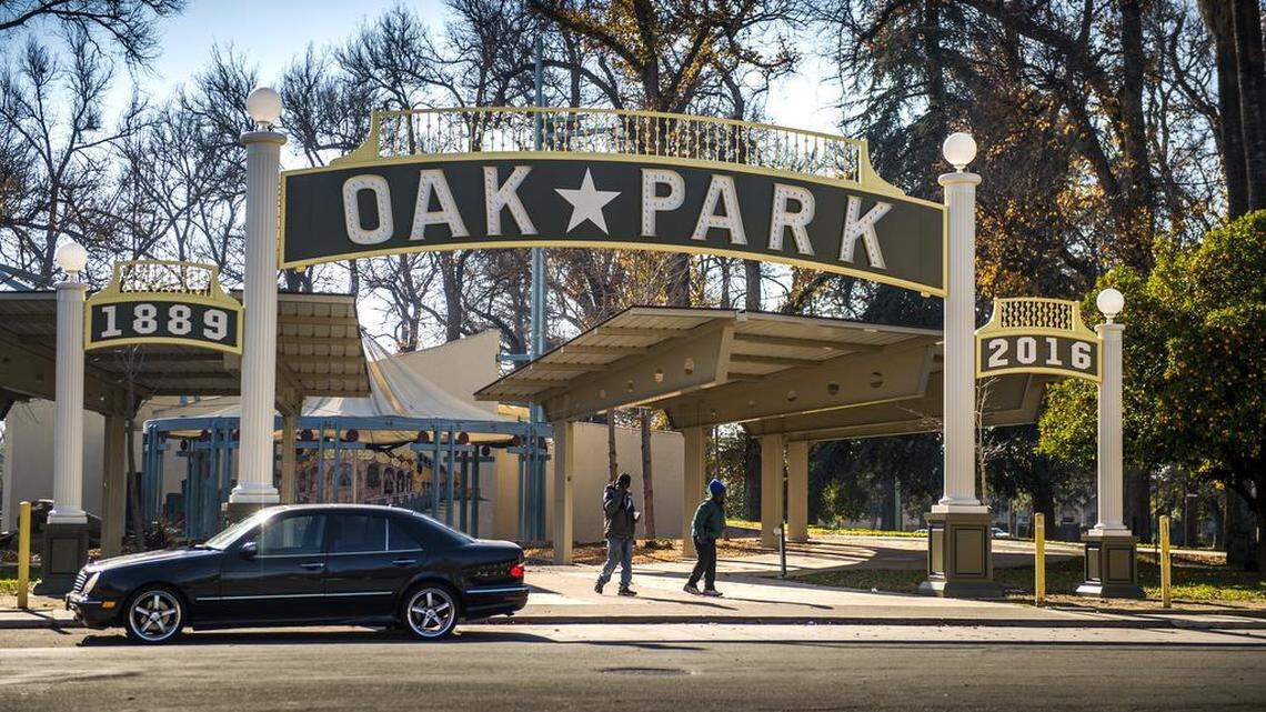 An Oak Park sign welcomes visitors to McClatchy Park at 5th Avenue and 35th Street. UC Davis, in partnership with the city of Sacramento, is planning to open a massive research park a few miles away, which could put even more pressure on housing prices in the neighborhood.