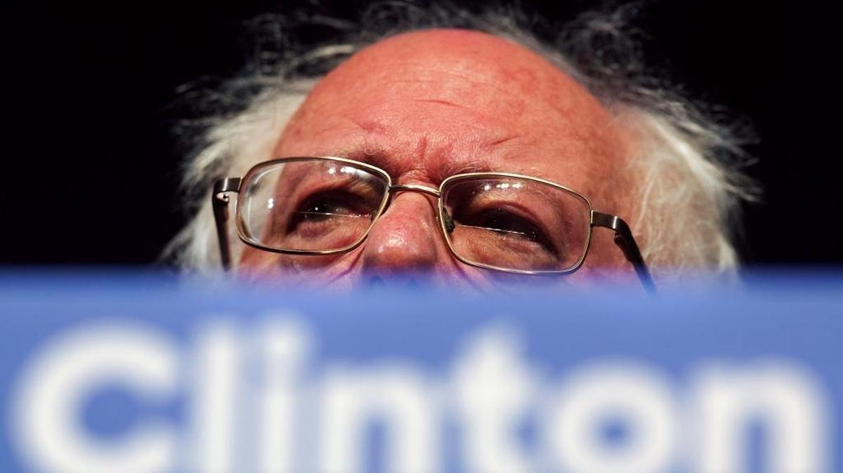 Sen. Bernie Sanders campaigns for Hillary Clinton in Kalamazoo, Mich., while some of his admirers are trying to undercut her.