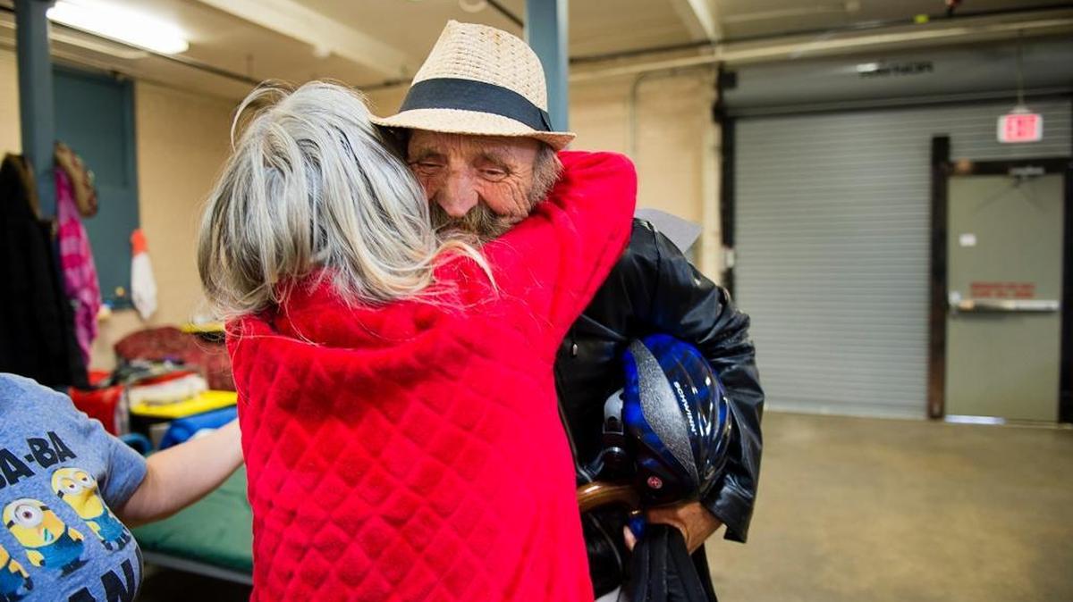 Egbert Visker is hugged as he leaves a homeless shelter in Placer County last November for a new home in Auburn bought with a federal Whole Person Care money. Both candidates for Placer County supervisor want to continue efforts on the homeless.