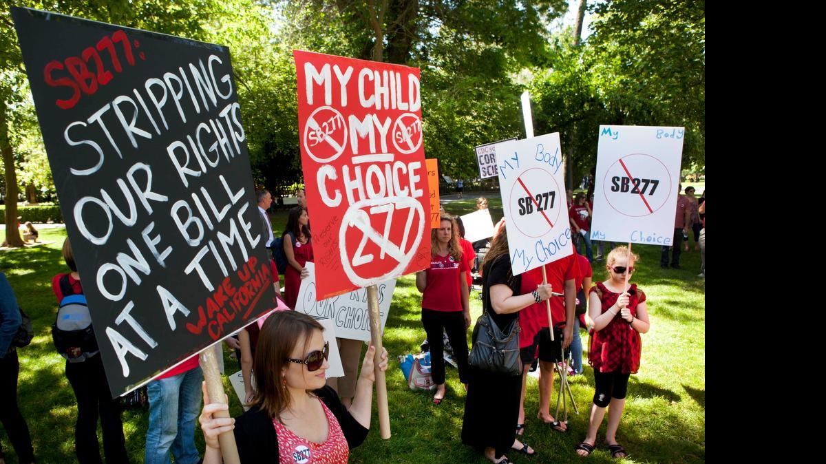 
Opponents of the vaccination bill SB 277 rally outside the Capitol. The full Senate could vote on the bill as early as this week.

