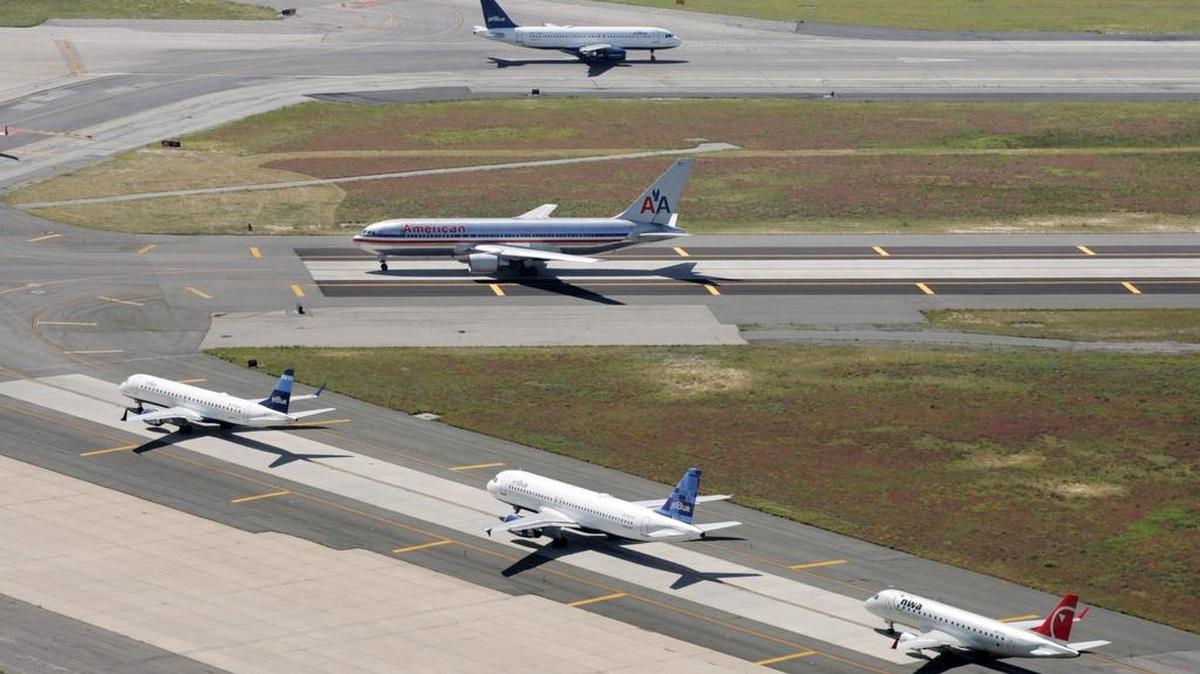 
Planes taxi on runways at John F. Kennedy International Airport in New York. 
