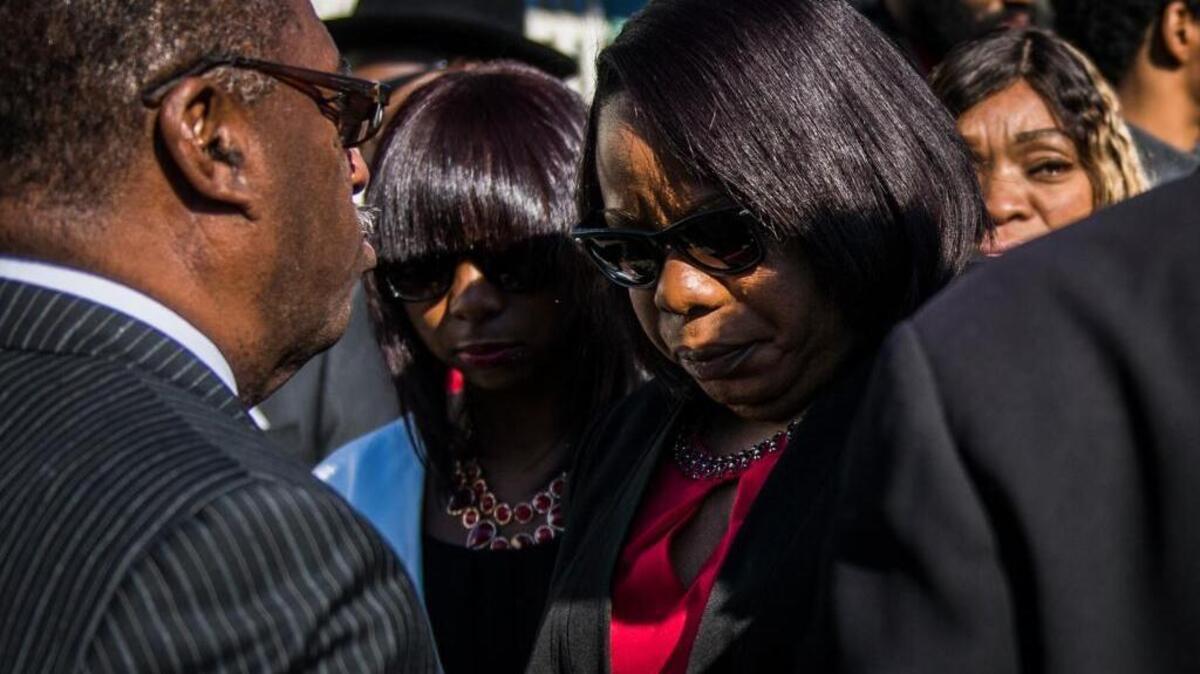 Nicole Clavo arrives at the funeral of her son, Jaulon “J.J.” Clavo, in November. On Thursday, she tearfully thanked the community for the efforts to catch her son’s killer.