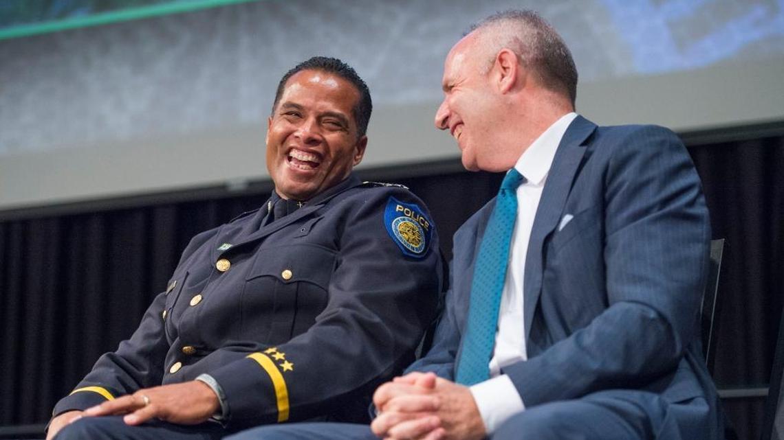 Daniel Hahn shares a laugh with Mayor Darrell Steinberg before he is sworn in as police chief on Aug. 11.