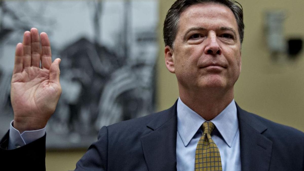 FBI Director James Comey is sworn at a House Oversight and Government Reform Committee hearing in Washington on Thursday, July 7, 2016. Comey appeared before the committee to explain his finding that no reasonable prosecutor would bring a criminal case against Hillary Clinton, the former secretary of state and presumptive Democratic presidential nominee.