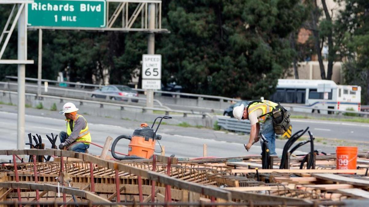 Crews work in February on a joint project between Caltrans and the city of Sacramento on a connector bridge between Second Street and Capitol Mall. Without a federal or state funding package, local officials are promoting a half-cent sales tax increase to repair roads and boost Regional Transit.