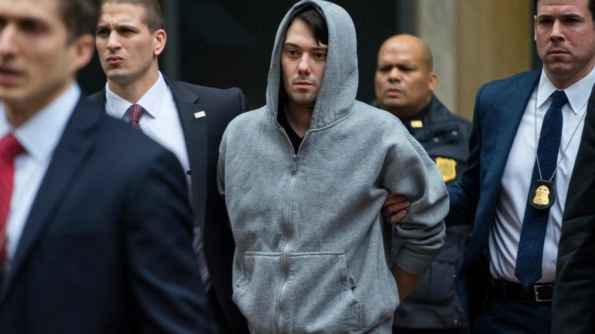 Martin Shkreli, the former hedge fund manager under fire for ratcheting up the price of a life-saving drug, is escorted by law enforcement agents in New York after being arrested on suspicion of securities fraud. As a result of the charges, San Francisco-based KaloBios Pharmaceuticals fired Shkreli as CEO.