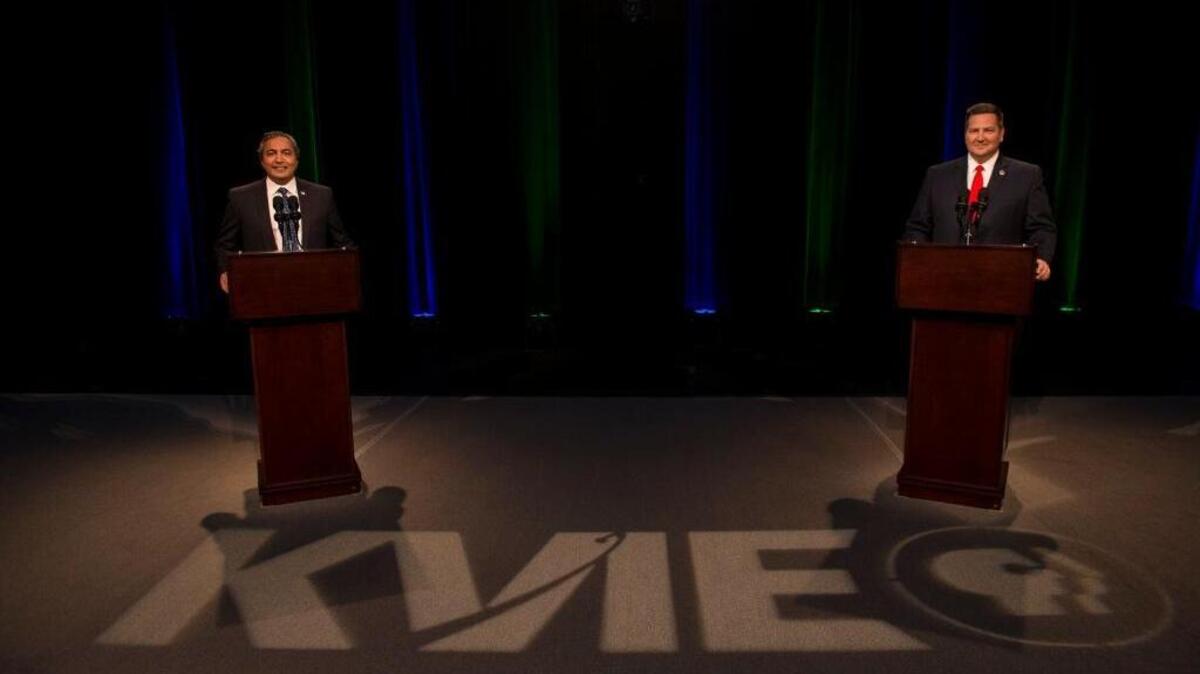 Democratic U.S. Rep. Ami Bera, left, and his Republican challenger Sacramento County Sheriff Scott Jones participate in a debate for the highly competitive 7th Congressional District seat.