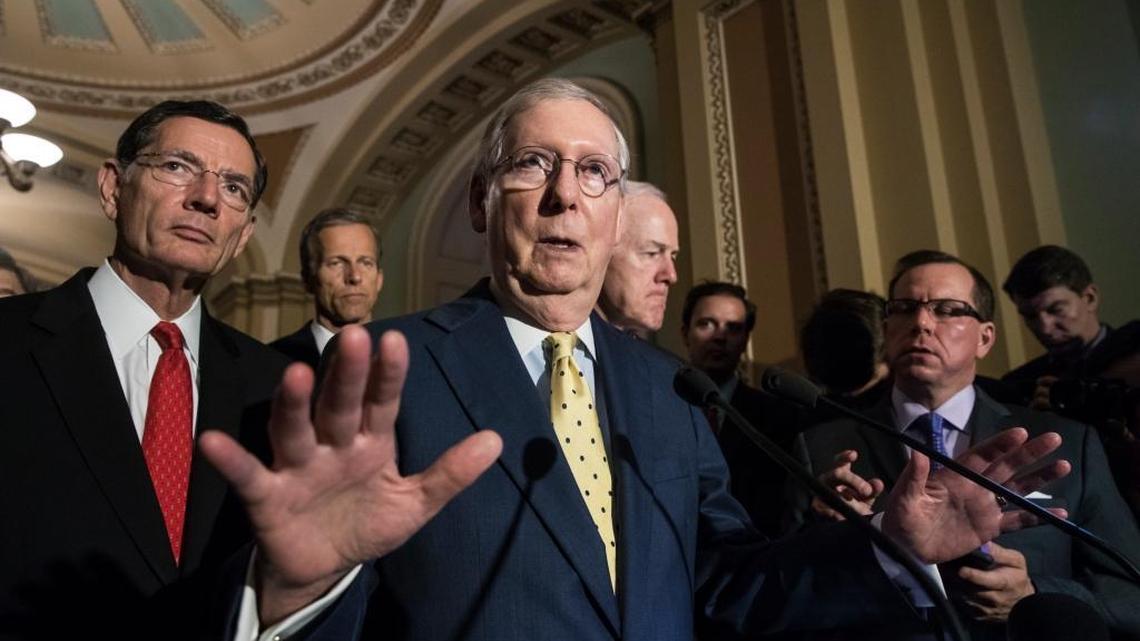 Senate Majority Leader Mitch McConnell, R-Ky., center, joined by other Republican lawmakers, speaks following a closed-door strategy session Tuesday at the Capitol in Washington. McConnell says Republicans will have a “discussion draft” of a GOP-only bill scuttling former President Barack Obama’s healthcare law by Thursday.