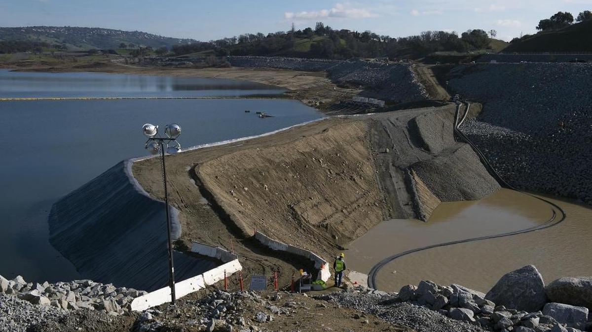 A construction worker looks over the coffer dam at the Folsom Dam auxiliary spillway construction site in Folsom last month.