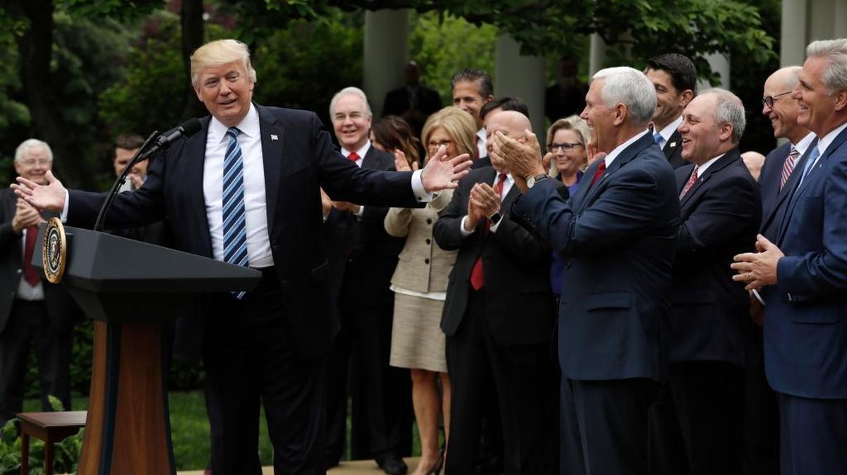President Donald Trump speaks in the Rose Garden of the White House in Washington, Thursday after the House pushed through a health care bill. House Majority Leader Kevin McCarthy, R-Bakersfield, is at far right.