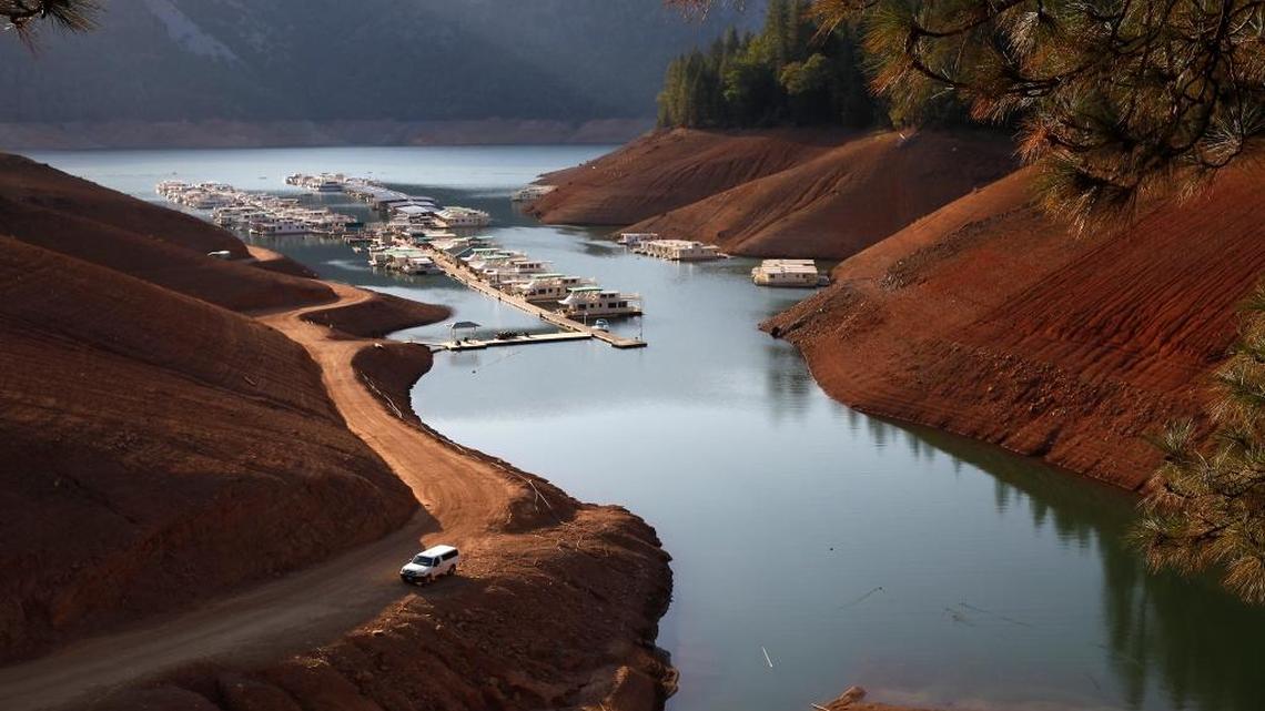 
Docks at a marina in Lake Shasta have been moved farther away from their shoreline resorts as the drought drags on.
