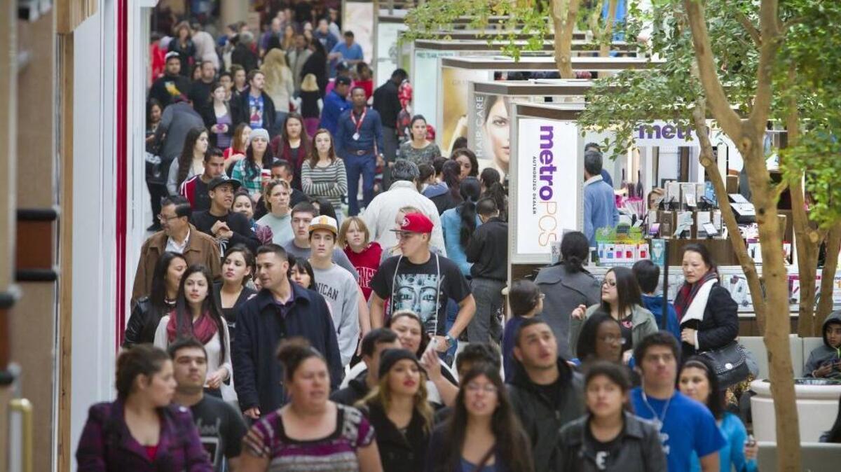 Shoppers crowd into Sacramento’s Arden Fair Mall on Black Friday 2014.