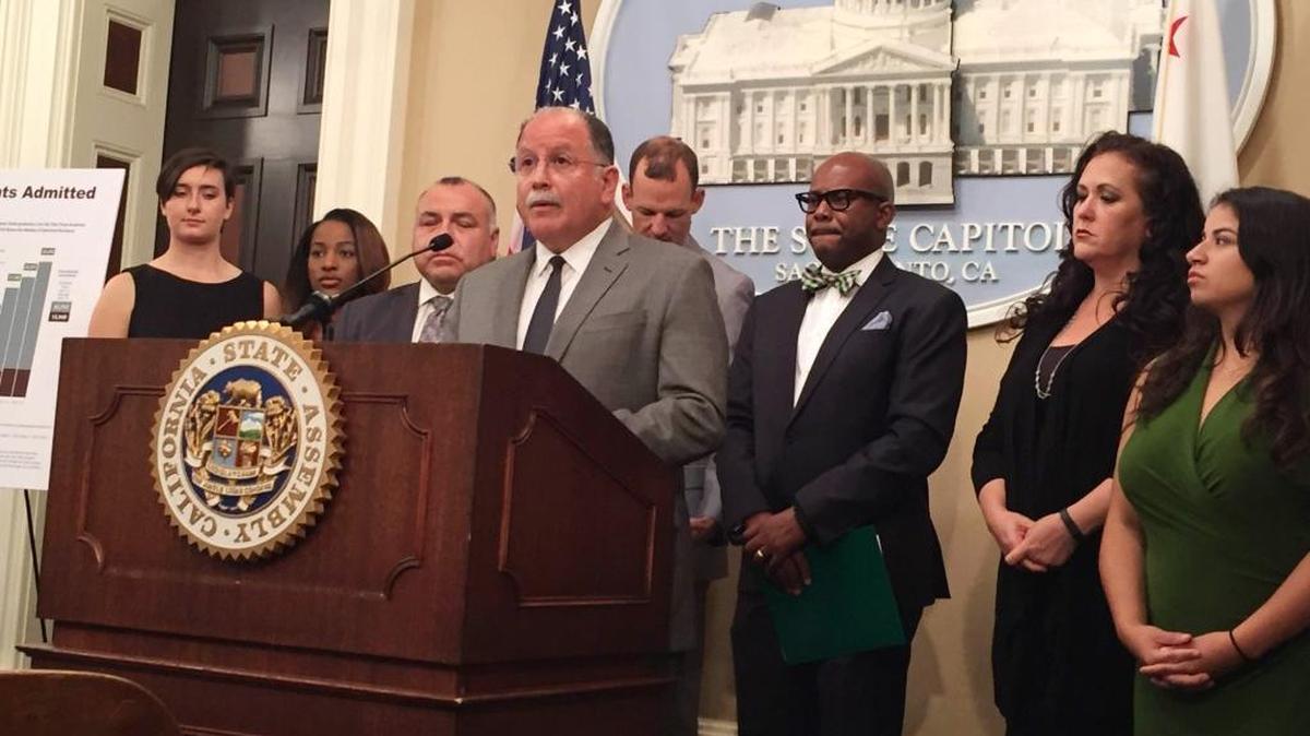 Assemblyman Jose Medina, D-Riverside, and other legislators at a news conference in April on University of California enrollment.