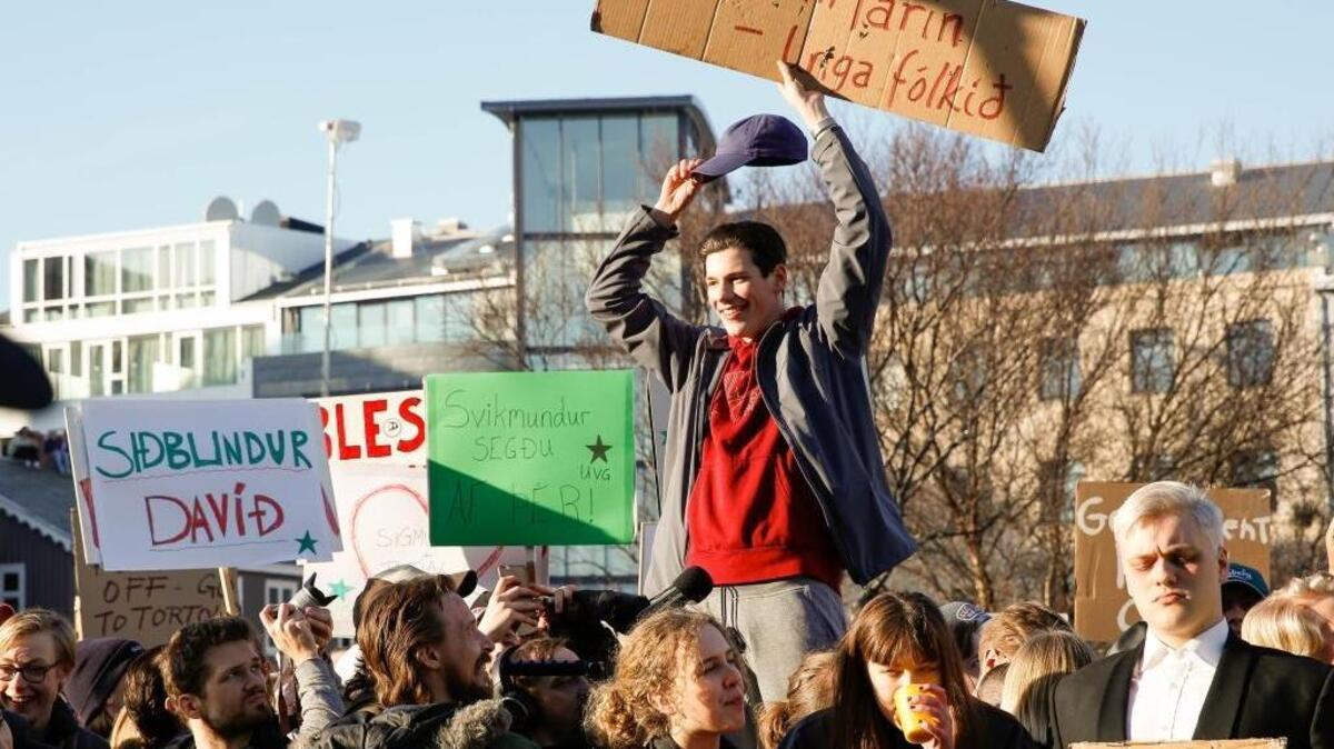 People gather to demonstrate against Iceland’s prime minister on Monday. He resigned Tuesday, the first political casualty of an international tax evasion scheme.