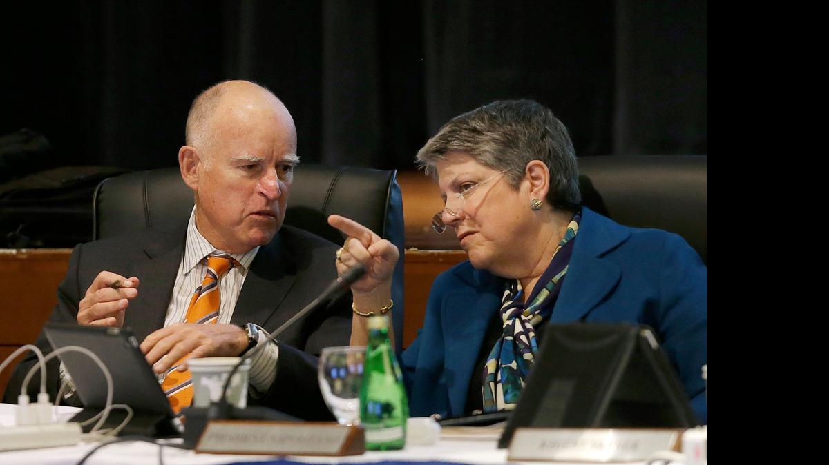 
UC President Janet Napolitano talks with Gov. Jerry Brown during a UC Board of Regents meeting. Brown’s revised budget will shore up the university and head off a planned tuition increase.
