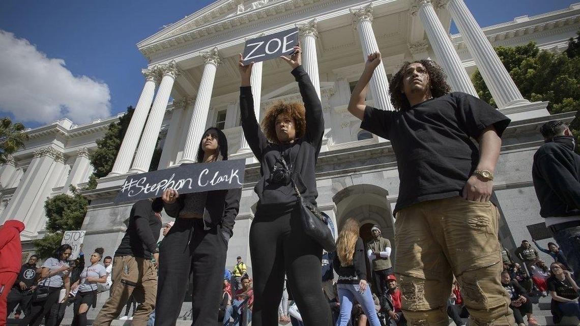 Demonstrators gather on the west steps of the state Capitol during a demonstration on Friday, March 23, 2018 protesting the shooting of Stephon Clark by Sacramento police.