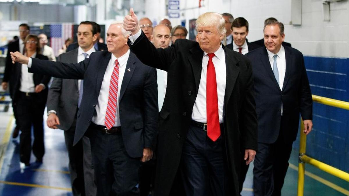 Donald Trump visits a Carrier factory in Indianapolis on Dec. 1. He vows to add 25 million jobs in the next decade.