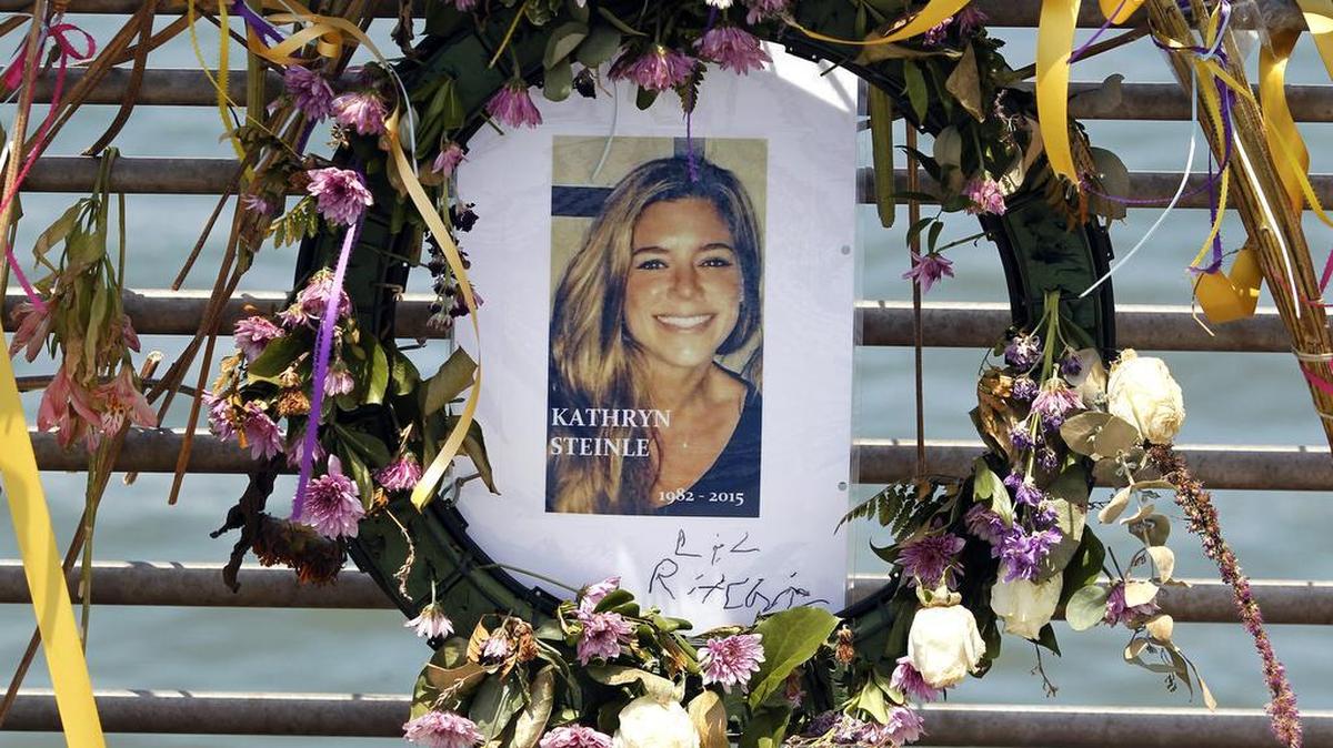 A portrait of Kate Steinle is shown in this 2015 file photo at a memorial on Pier 14 in San Francisco. Opening arguments start Monday in the trial of the man charged with her murder, Jose Ines Garcia Zarate.