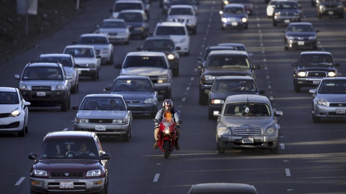 Can motorcycles split lanes? Can you text at a red light? These 5 California road laws rule