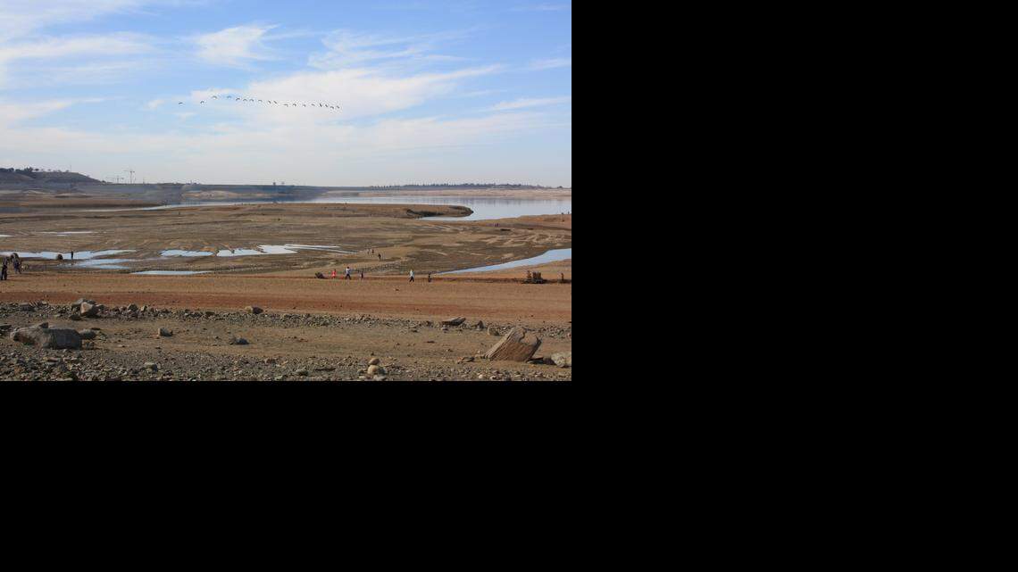 
Tree stumps, boulders and rocks normally covered by Folsom Lake lay exposed by two years of drought. Being able to see the front of Folsom dam in the distance gave an eerie feeling to the landscape.
