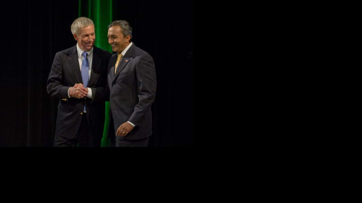
Democratic Rep. Ami Bera, right, and Republican Doug Ose shake hands after debating at KVIE studios in Sacramento on Oct. 8. Their U.S. House race is the most expensive congressional battle in the country.
