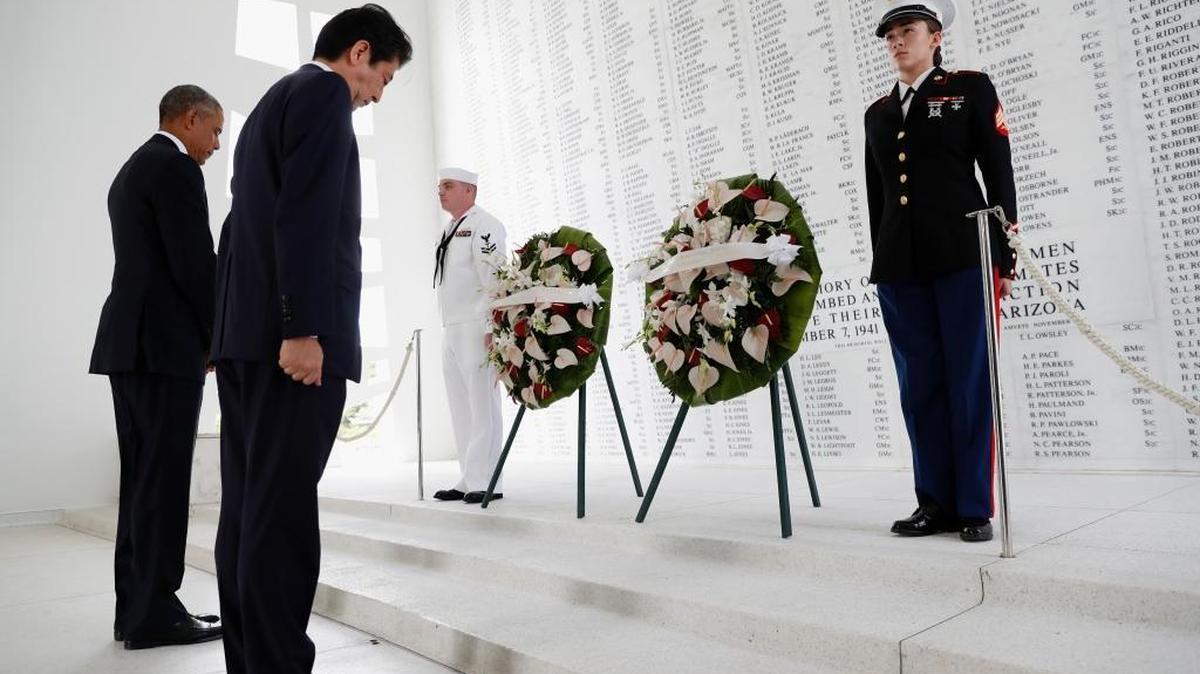 President Barack Obama and Japanese Prime Minister Shinzo Abe lay wreaths Tuesday at the USS Arizona Memorial.