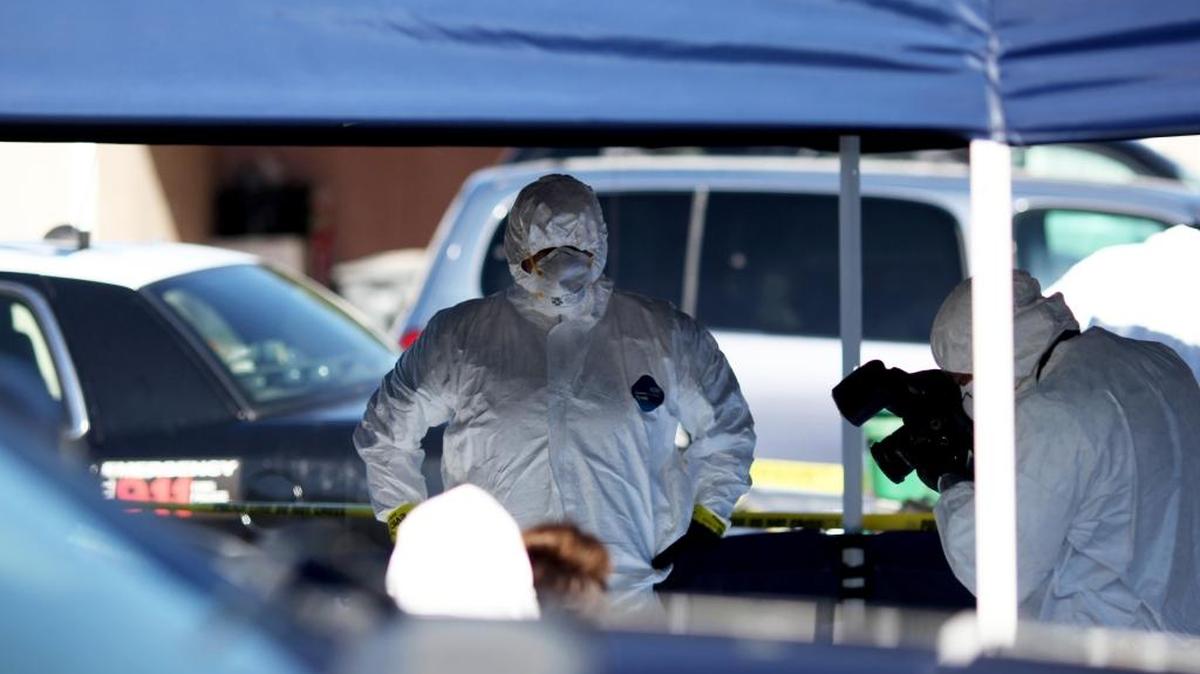 Salinas Police Crime Scene Investigation technicians photograph evidence at the home of Tami Joy Huntsman and her companion, Gonzalo Curiel, suspected of murdering two children and torturing a third.